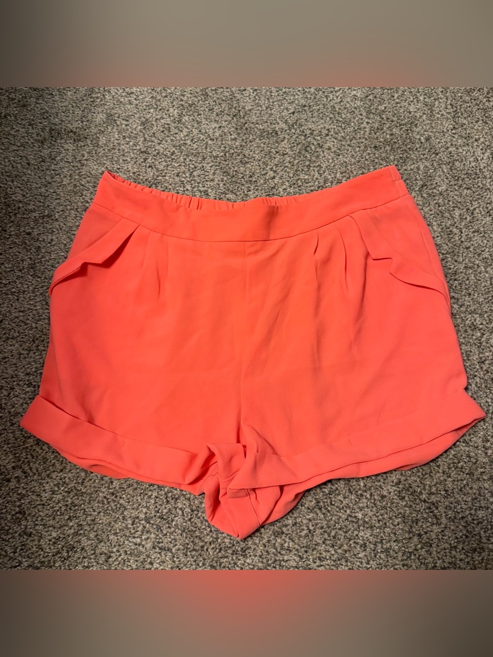 Women’s coral Skies Are Blue shorts with an elastic waistband. Size L NWT